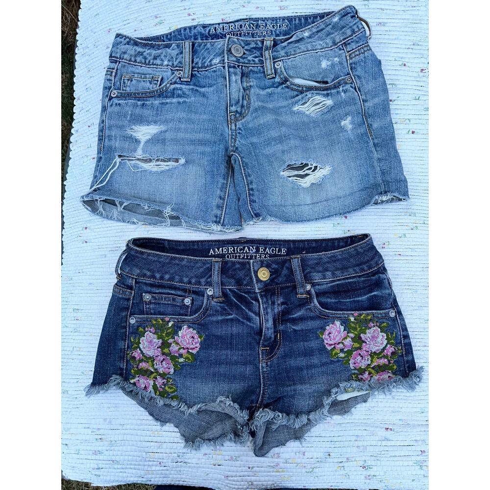 2 AEO CUTOFF DENIM SHORTS, 1 FLORAL EMBROIDERED, BOTH SIZE 0